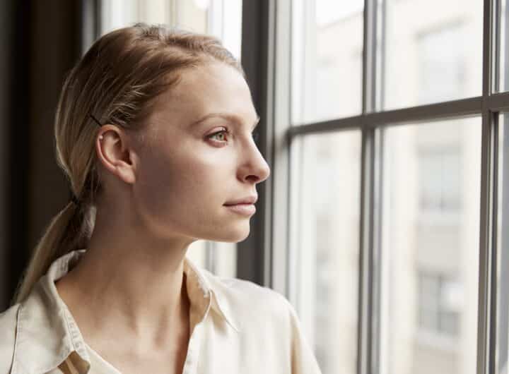 Woman looking out the window