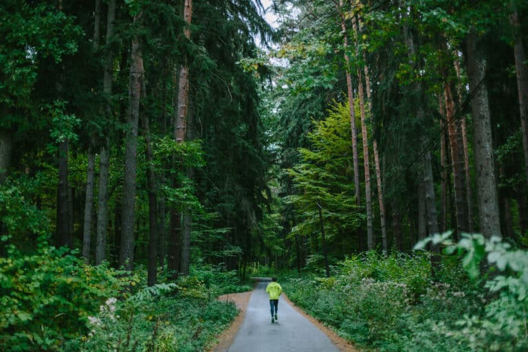 Man running in forest