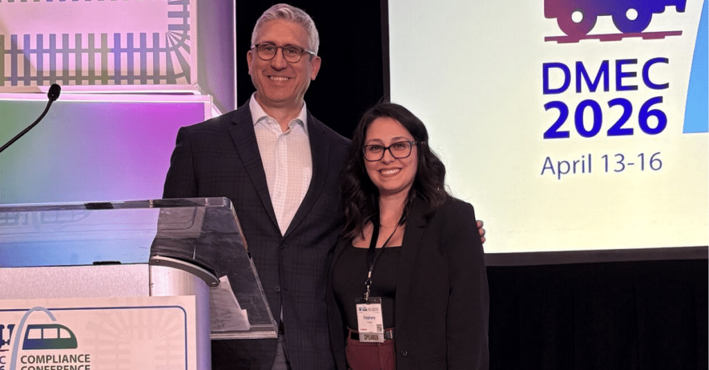 Matt Morris and Stephany Correa posing for a photo after their session at DMEC 